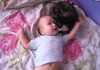 Sweet And Kind Kitty Soothes Crying Baby